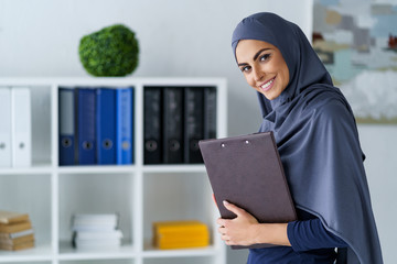 Cheerful woman in the office
