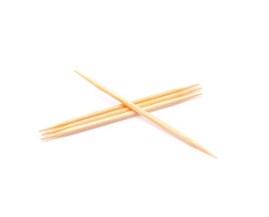 wooden toothpick closeup on isolated white background