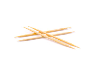 wooden toothpick closeup on isolated white background