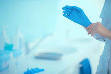 doctor in rubber gloves / concept sterility purity, medical clinic, laboratory, gloves on the hands of a doctor