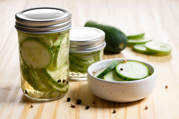 Obraz na płótnie Canvas Pickled cucumbers with spices