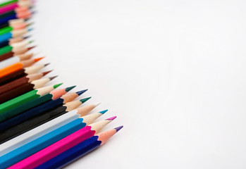 Colored pencils on a white background, with space for your text, blank for banner