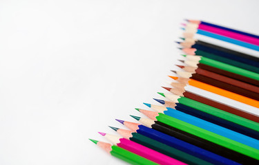 Colored pencils on a white background, with space for your text, blank for banner