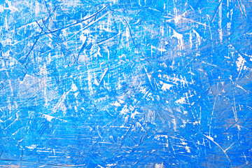 Abstract blue background with scuffs and scratches. Imitation of ice and cold surface. Beautiful stylish blank for backdrop.