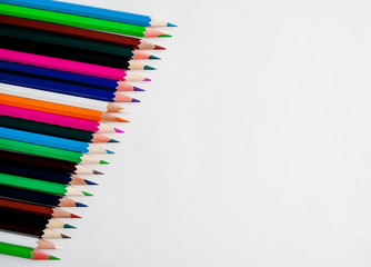 Colored pencils on a white background, with space for your text, blank for banner