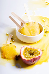 Homemade popsicles with passion fruit juice