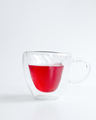 Cup Hot red tea, front view isolated on white background.
