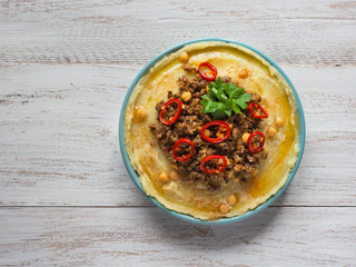 Hummus with meat. Traditional arab food of lamb. 