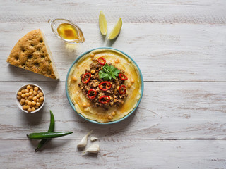 Hummus with meat. Traditional arab food of lamb. 
