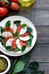 Caprese salad with pesto and balsamic vinegar