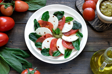 Caprese salad with pesto and balsamic vinegar