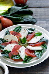 Caprese salad with pesto and balsamic vinegar