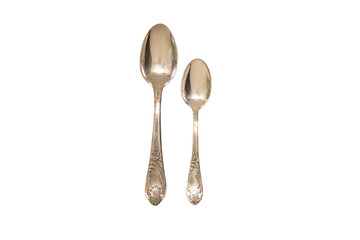 Dessert and teaspoons on a white isolated background.Flat lay