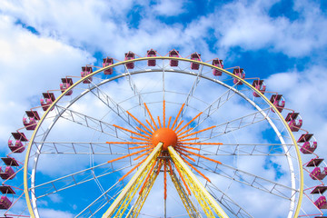 Ferris Wheel Over Blue Sky wich white clouds