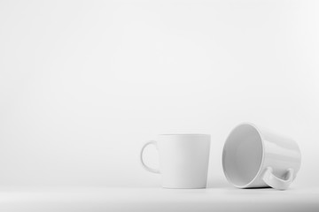 white ceramic coffee cup on white background.