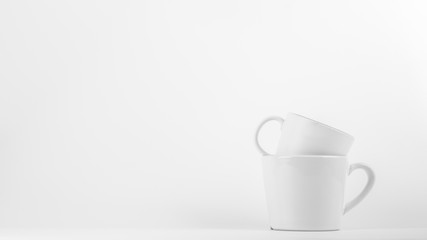 white ceramic coffee cup on white background.