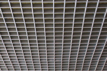 Suspended ceiling in the form of a lattice made of stainless steel in the production area (perspective)