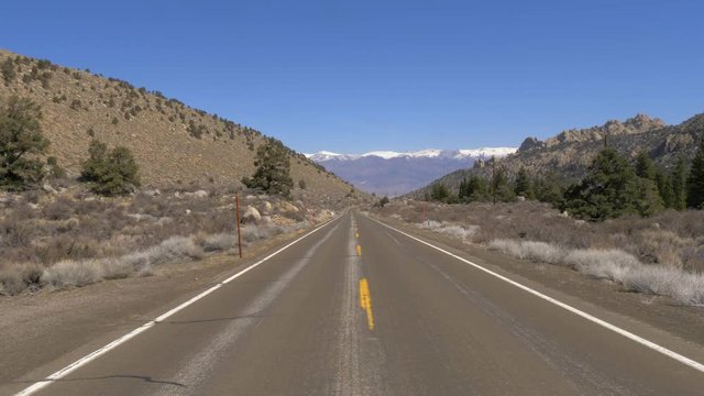 Scenic road through the mountains of Sierra Nevada - travel photography