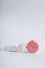 Medicine tablets on white background , Pharmacy theme
