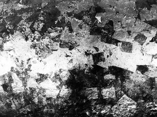 Grunge black and white pattern. Monochrome particles abstract texture. Background of cracks,...