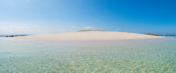 deserted beach on an impressive islet