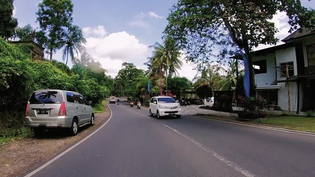 Nusa Dua, Bali / Indonesia-01 20 2019: Hyperlapse1 on Bali road, camera mounted on car