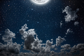 Obraz na płótnie Canvas backgrounds night sky with stars and moon and clouds.