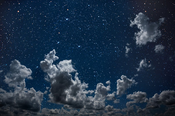 backgrounds night sky with stars and moon and clouds.