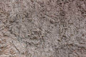 rough stone wall in brown color