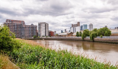River Lee East London with Canary Wharf in the background GB UK