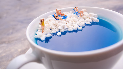 Dreams about holidays. Miniature people world.