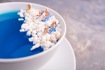 Dreams about holidays. Miniature people world.