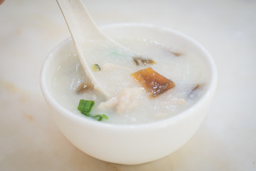 Cantonese rice Porridge with Century Egg and Pork and spring onion