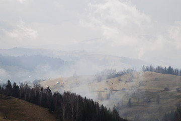 Fototapeta premium Foggy mountains are a picturesque landscape