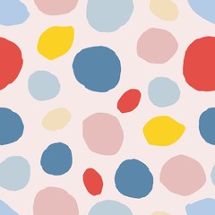 Abstract seamless pattern with colorful circle elements on pink background.