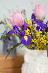 bouquet of tulips, iris, pussy willow and mimosa