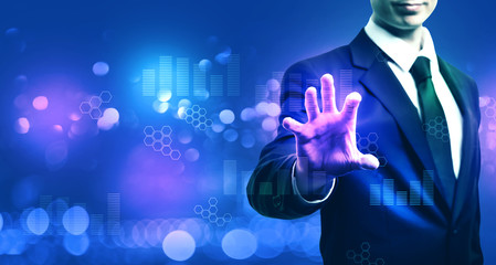 Digital graphs and hexagon grids with businessman on blurred blue light background