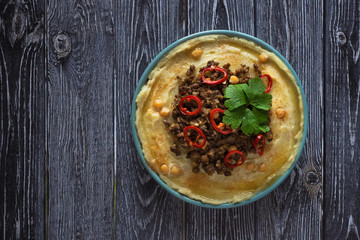 Hummus with meat. Traditional arab food of lamb. 