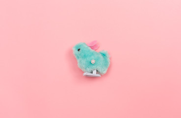 Easter holiday theme with little chick toys on pink background