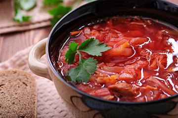 Aromatic soup with sour cream and black bread.