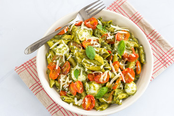 Vegetarian Basil Pesto Pasta with roasted cherry tomato and bocconcini / Mozzarella, Directly from Above photo.