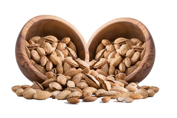 Almonds with shell in a wood bowl