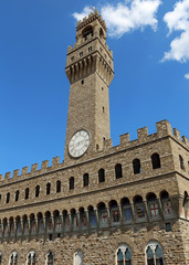 Fototapeta na wymiar Old Palace and blue sky in Signoria square in Florence Italy