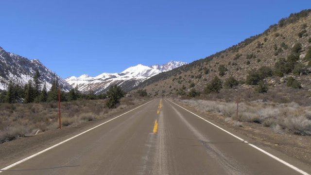 Scenic road through the mountains of Sierra Nevada - travel photography