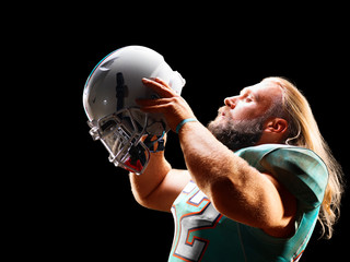 one american football player man studio isolated on black background