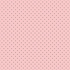Seamless pattern for textiles and wallpaper - small black polka dots on a pink background. Vector pattern