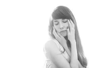 girl on white background hands on face