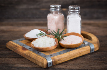Different types of salt in the wooden bowl