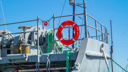 The orange ringbouy on the tip of the ship