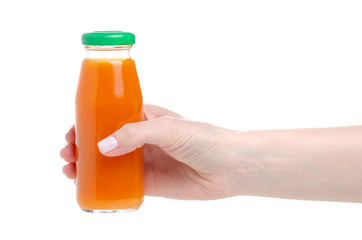 Children carrot juice in hand on a white background. Isolation